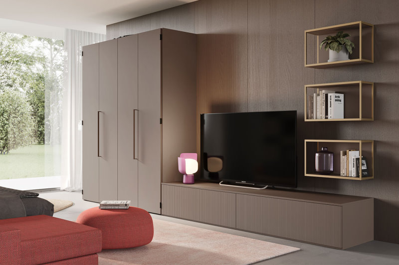 Soggiorno con mobile porta TV e armadio multifunzione con scrivania nascosta al suo interno