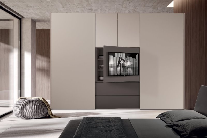 Armadio da camera con vano televisore apribile e casssettoni