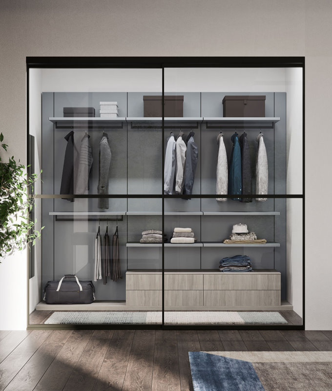 Cabina armadio in nicchia in una cameretta componibile