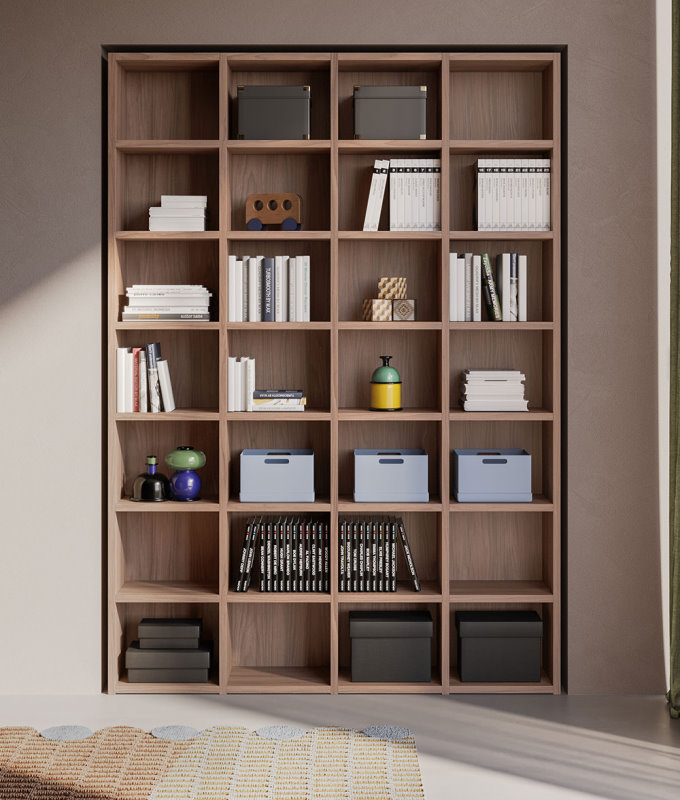 Libreria modulare simmetrica in una nicchia a parete