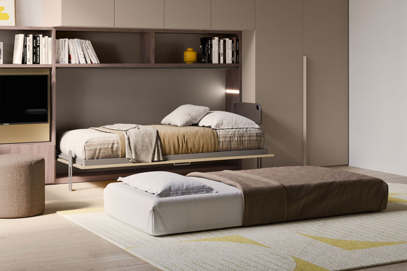 Camera con pouf letto singolo aperto a terra